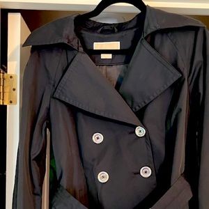 Medium Michael by Michael Kors short trench coat.